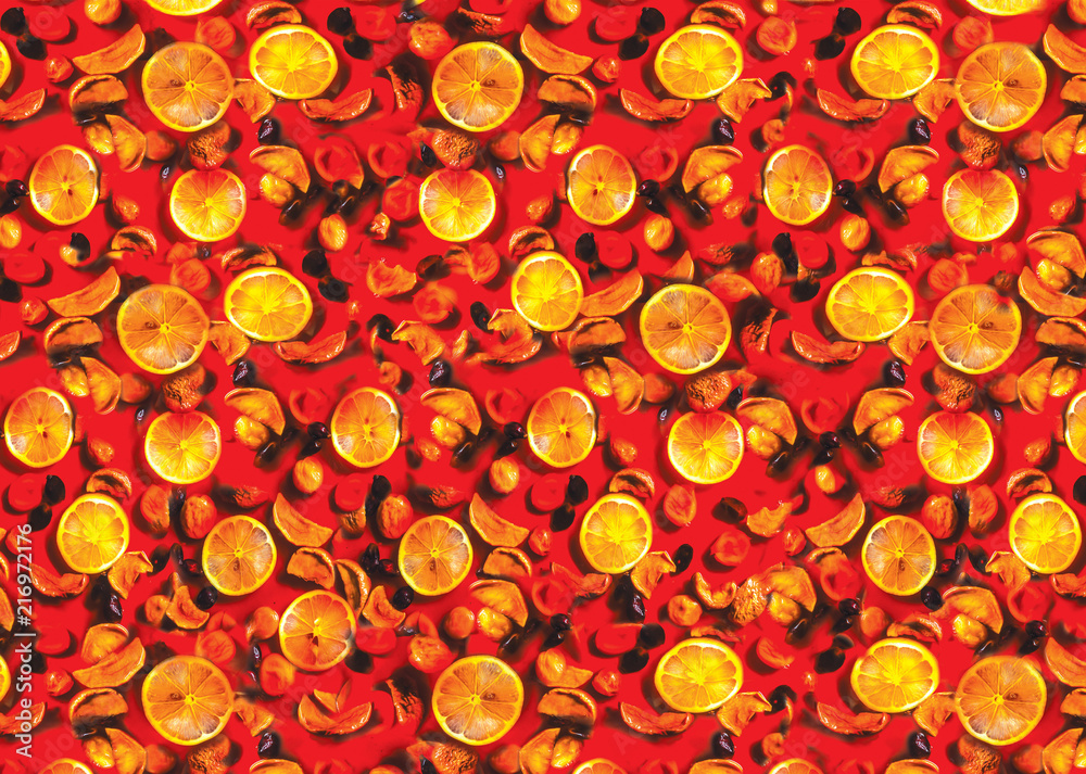 orange slices with dried fruits in red syrup orange slices with dried fruits in red syrup
