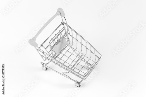 A supermarket trolley on a white background