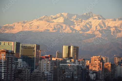landscape of mountain snow and cityscape