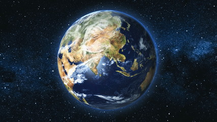 Realistic Earth Planet, rotating on its axis in space against the background of the Milky Way star sky. Astronomy and science concept. Continents and oceans. Elements of image furnished by NASA