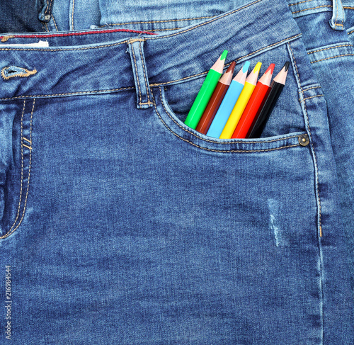  wooden pencils in the front pocket of blue jeans