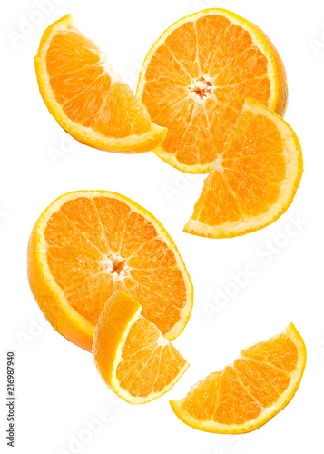 tangerines flying in the air isolated on white