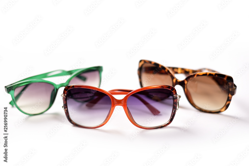 Women Fashionable Sunglasses on white background Women Fashionable Sunglasses on white background