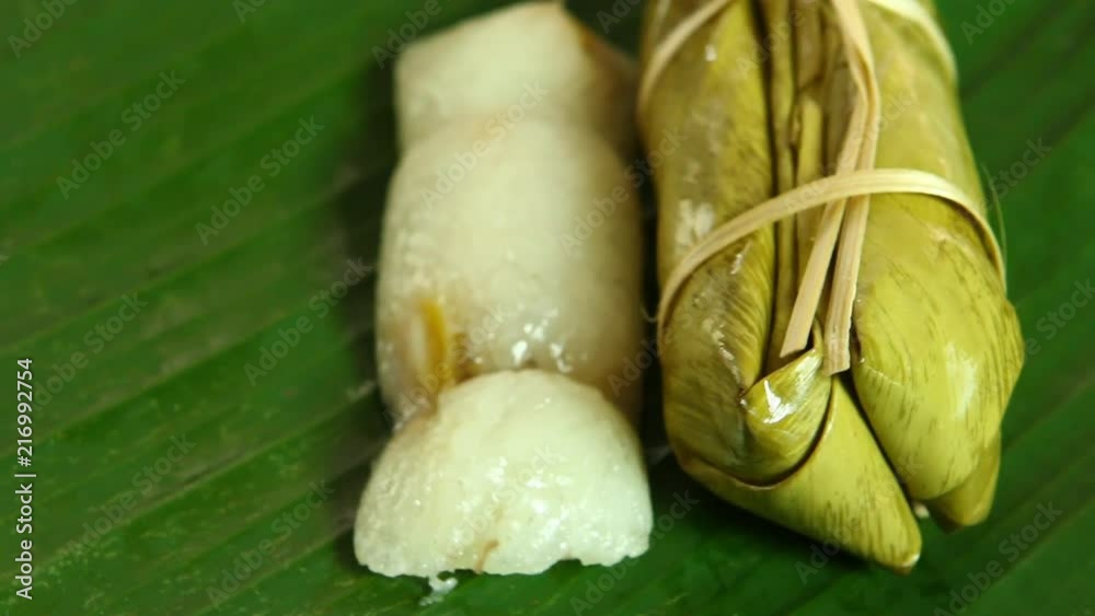 glutinous rice steamed  in banana leaf or Khao tom mat , Thai dessert