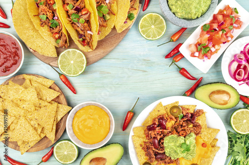 Overhead photo of an assortment of Mexican foods with copy space