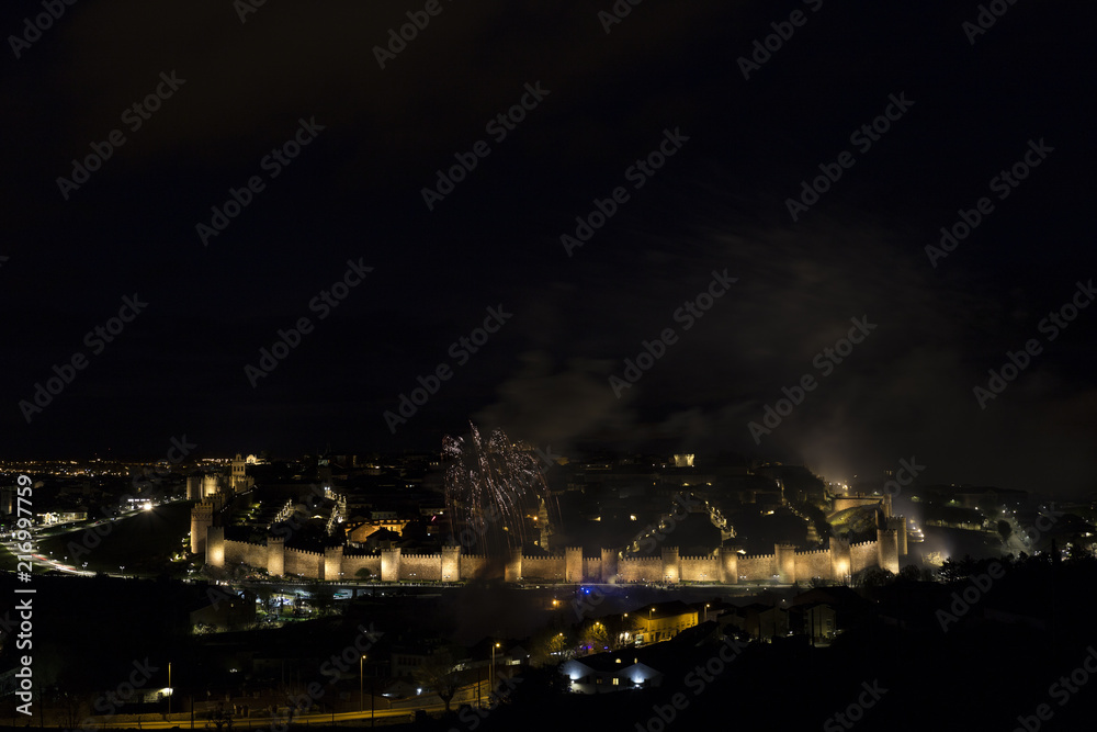 night views of fireworks in the city of Avila in Spain, medieval walled city perfectly preserved
