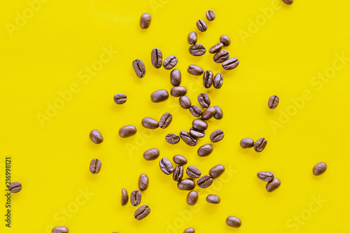 Fresh coffee bean on color background.