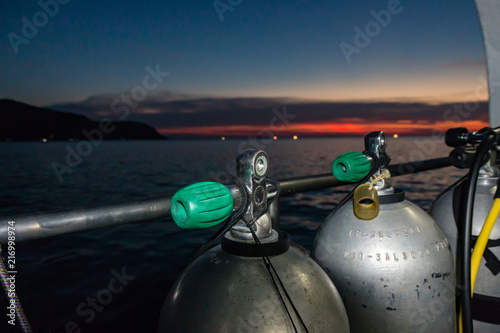 Fotografia, Obraz SCUBA tanks on a dive boat prior to a night dive