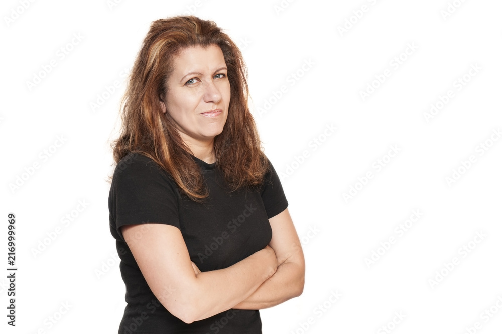 A beautiful woman on a white background shows that she doubts something. The woman has beautiful but uncut hair A beautiful woman on a white background shows that she doubts something. The woman has beautiful but uncut hair