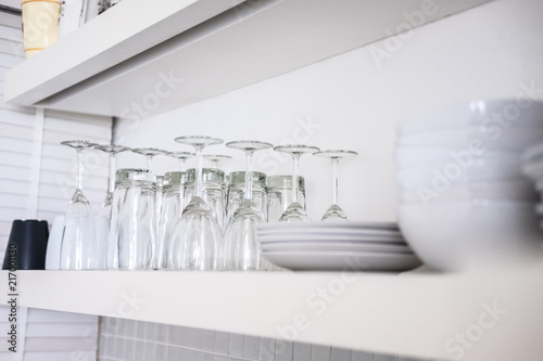 Kitchen glassware on white shelf, Interior design details