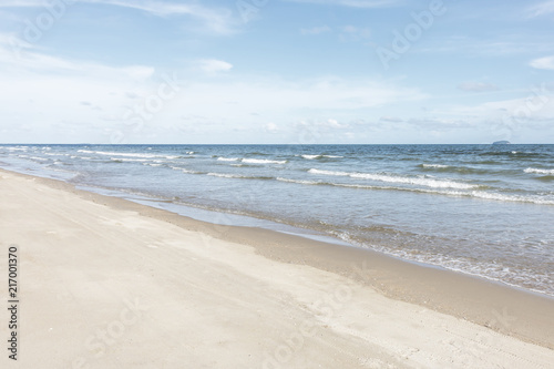 soft wave of the sea on the sandy beach. © adisorn123