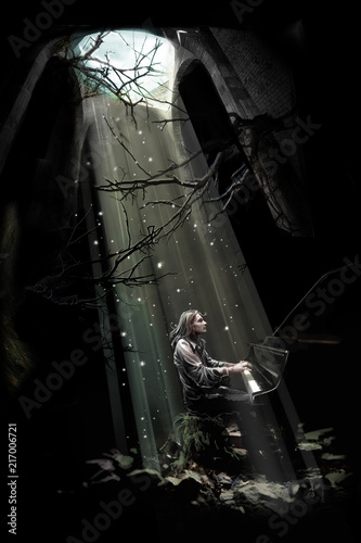 pianist in the destroyed tower plays in sunlight beams
