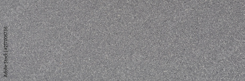 Background of gray granite with a texture of black and white spots. photo