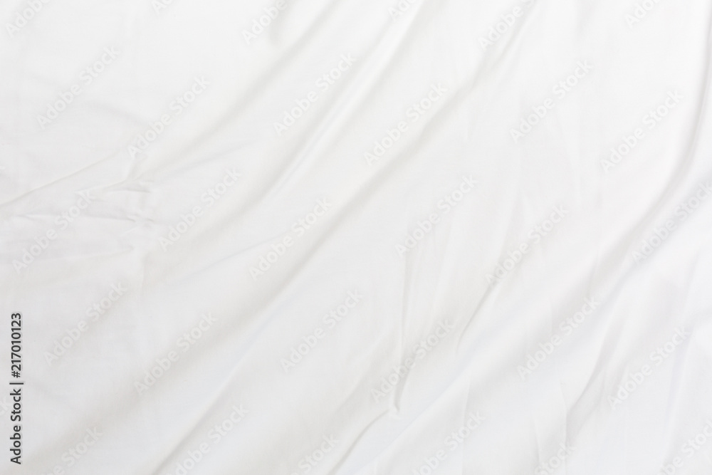 Obraz premium Top view of bedding sheets crease.