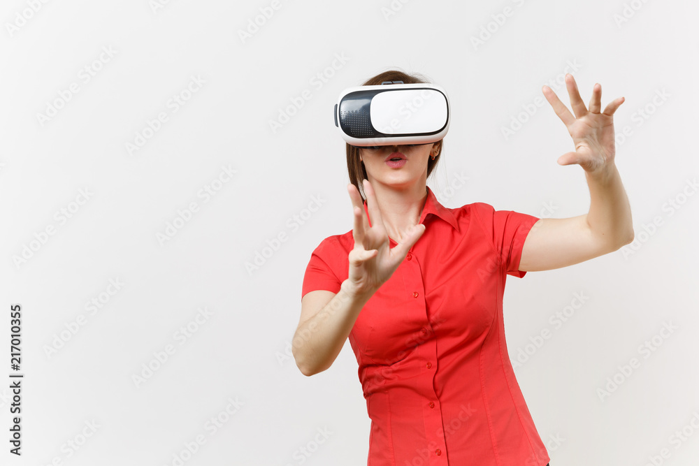 Business woman in headset of virtual reality on head touch something like push on button or pointing at floating virtual screen isolated on white background. Education future in high school concept. Business woman in headset of virtual reality on head touch something like push on button or pointing at floating virtual screen isolated on white background. Education future in high school concept.