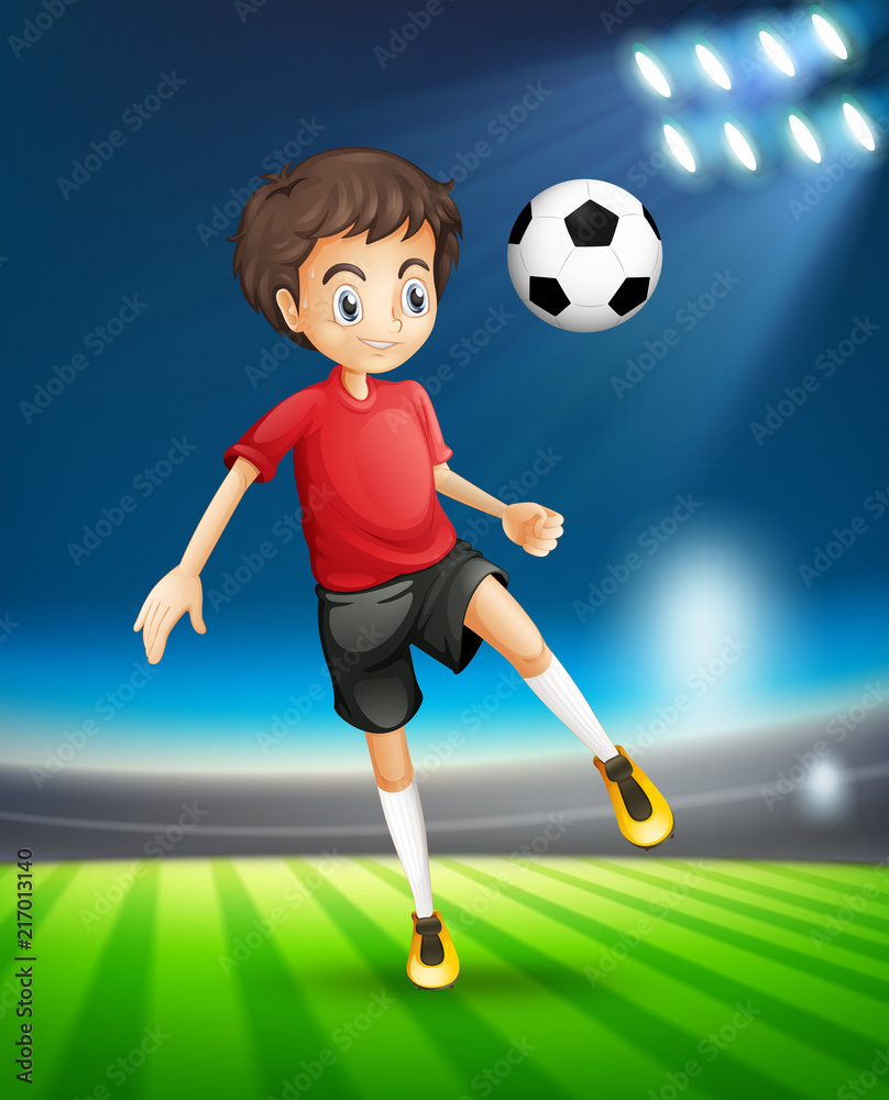 Soccer playing kicking ball