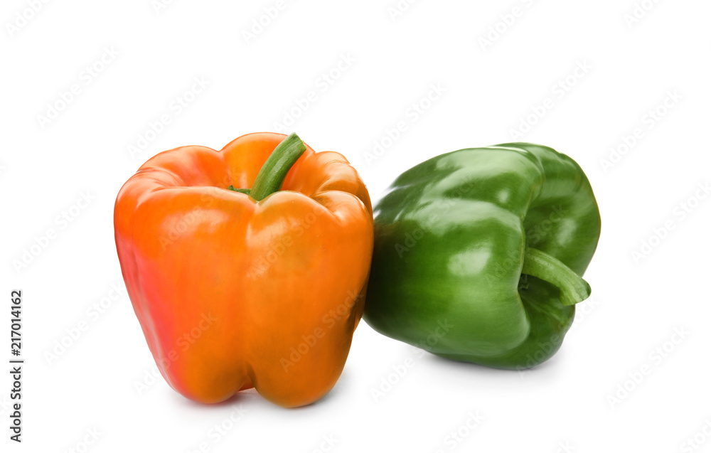 Raw ripe paprika peppers on white background Raw ripe paprika peppers on white background