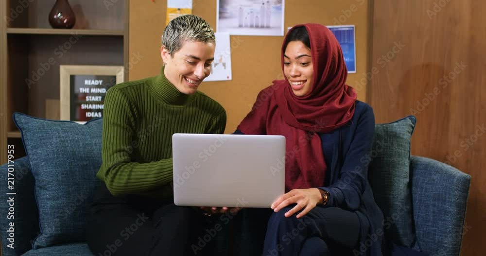 Executives discussing over laptop 4k Executives discussing over laptop 4k