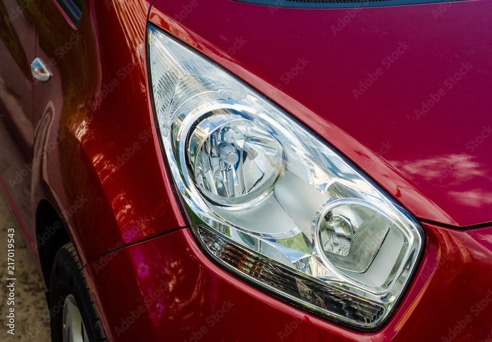 Car head light red in the street