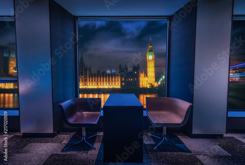 Photography Modern living room with view Big Ben at night in Landon, UK.