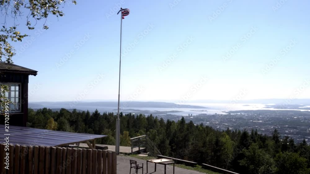 Panoramic view of Oslo, Norway from Grefsenkollen hill in sunny weather with blue sky. Panoramic view of Oslo, Norway from Grefsenkollen hill in sunny weather with blue sky.