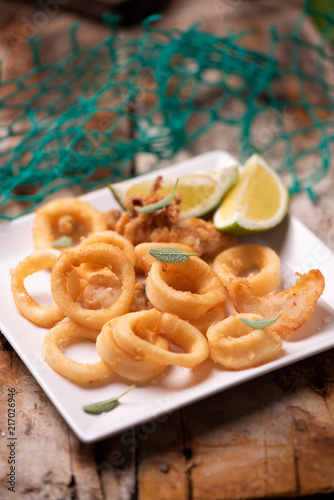Golden fried calamari squid on a plate