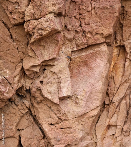 Red Stone Face in Rock Cliff