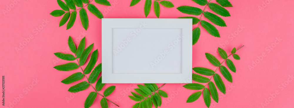 Frame mock up with fresh green leaves