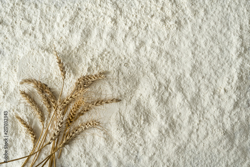Wheat and white flour texture background