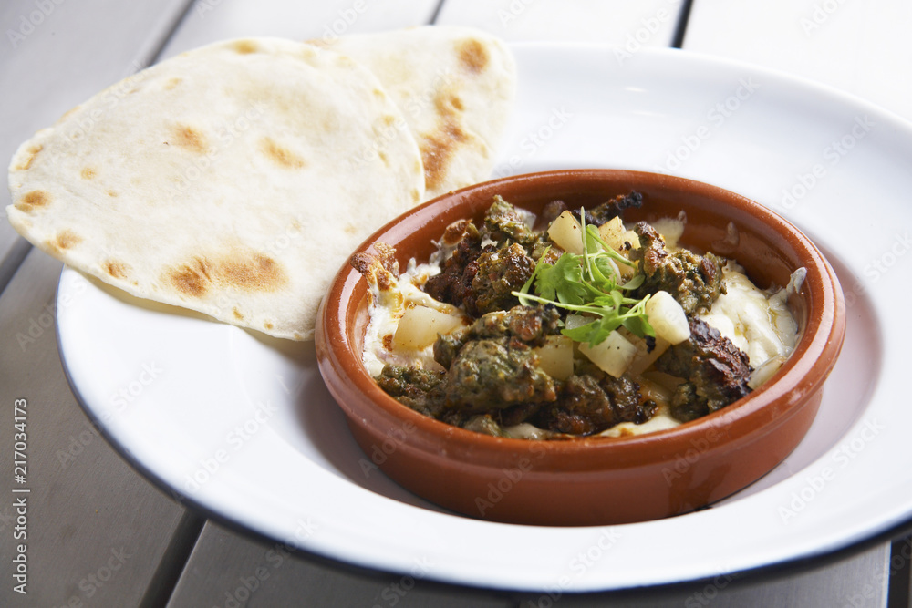 Beef in flambe cheese taco