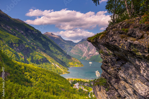 Geiranger - July 30, 2018: Flydalsjuvet viewpoint at the stunning UNESCO Geiranger fjord, Norway photo