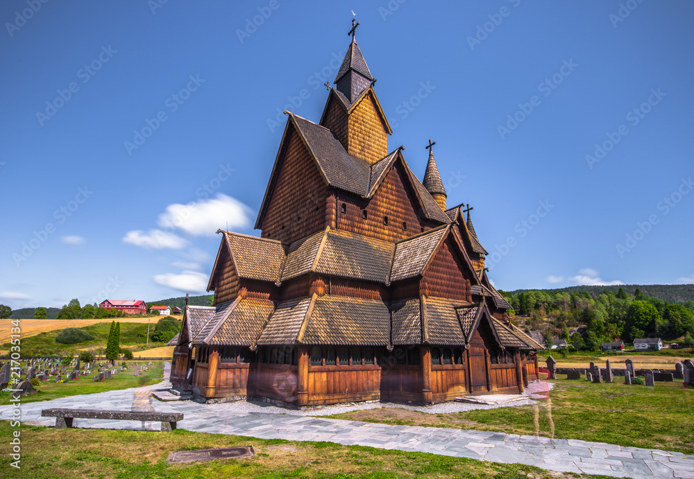 Heddal - August 01, 2018: Medieval Heddal stave church, the largest of the remaining stave churches in Telemark, Norway Heddal - August 01, 2018: Medieval Heddal stave church, the largest of the remaining stave churches in Telemark, Norway