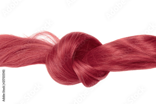 Knot of red hair, isolated on white