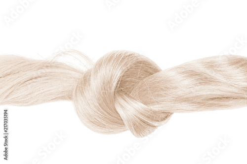 Knot of blond hair, isolated on white