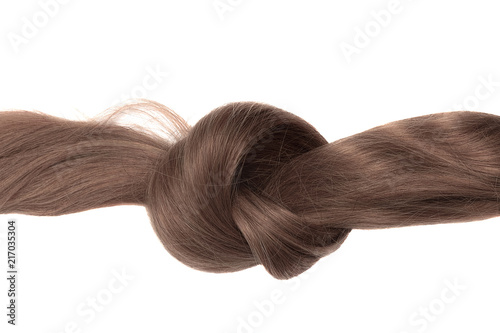 Knot of brown hair  isolated on white