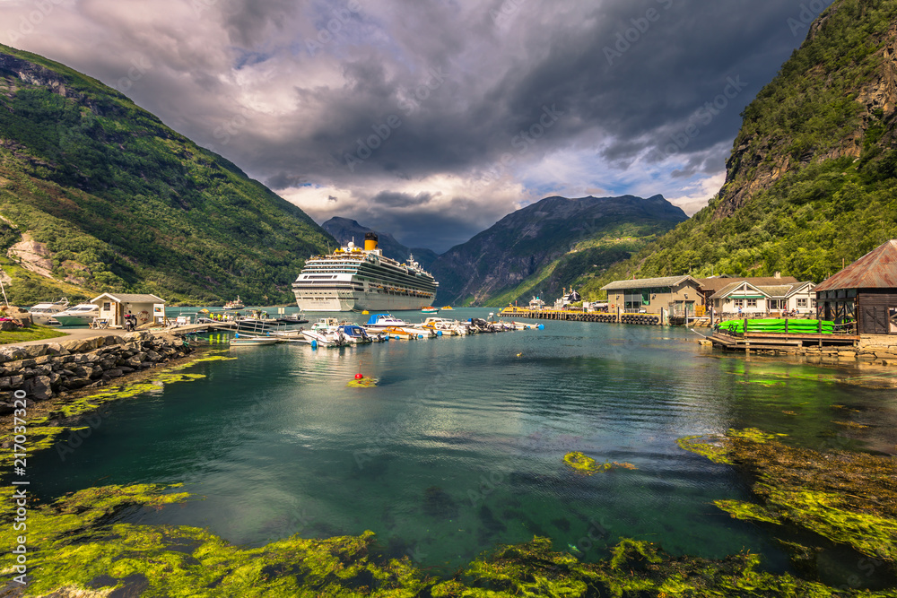 Geiranger - July 30, 2018: Cruise boat in the UNESCO town of Geiranger, Norway