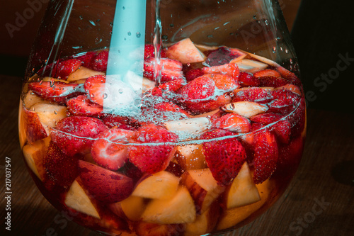 berry punch in a glass goblet photo