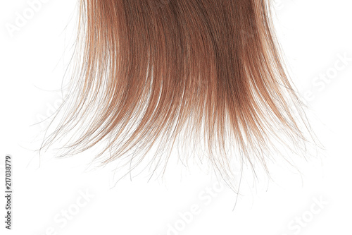 Tips of brown hair on white background