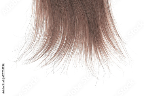 Tips of brown hair on white background