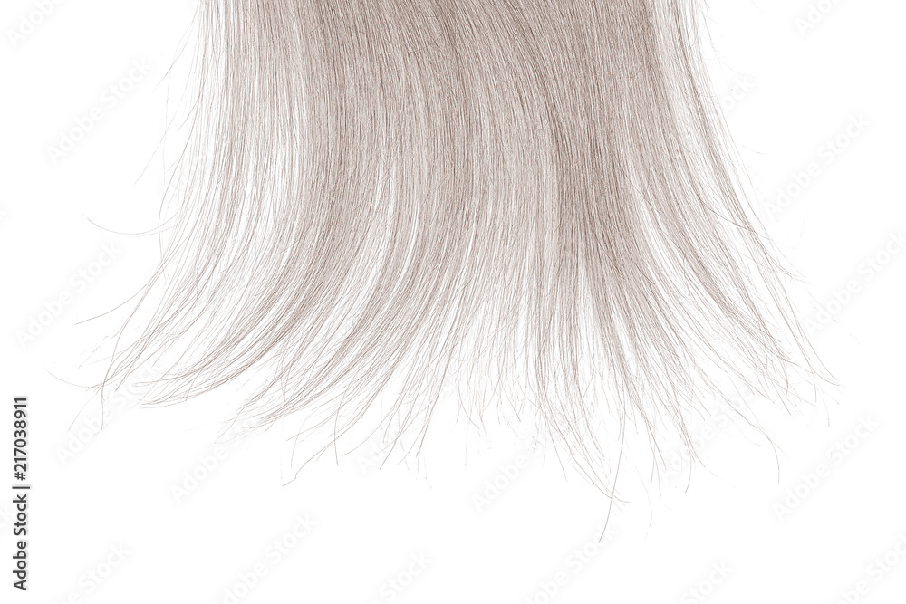 Tips of blond hair on white background