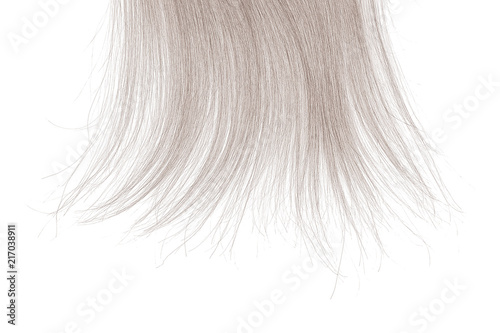 Tips of blond hair on white background