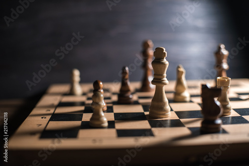 Billede på lærred Chess on chessboard close up