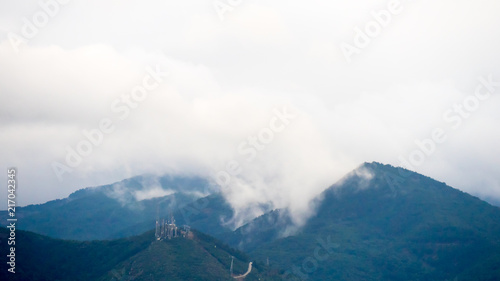 mountains and clouds landscape with Radio television masts and towers and Base station pole at Balcova, izmir © ersoy