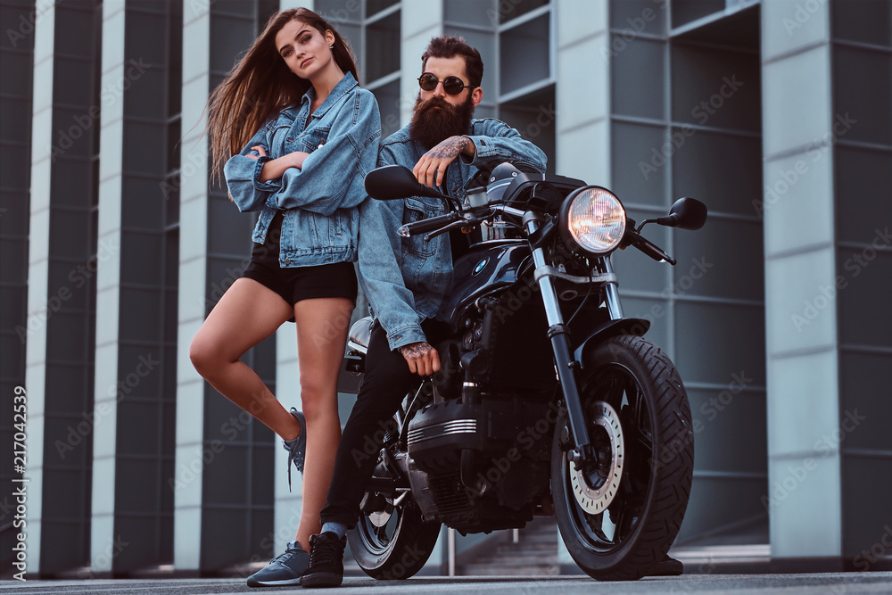 Couple posing on the bike - PixaHive