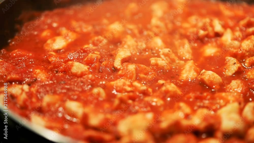 Chicken Breast Prepared With Tomato Sauce In Frying Pan