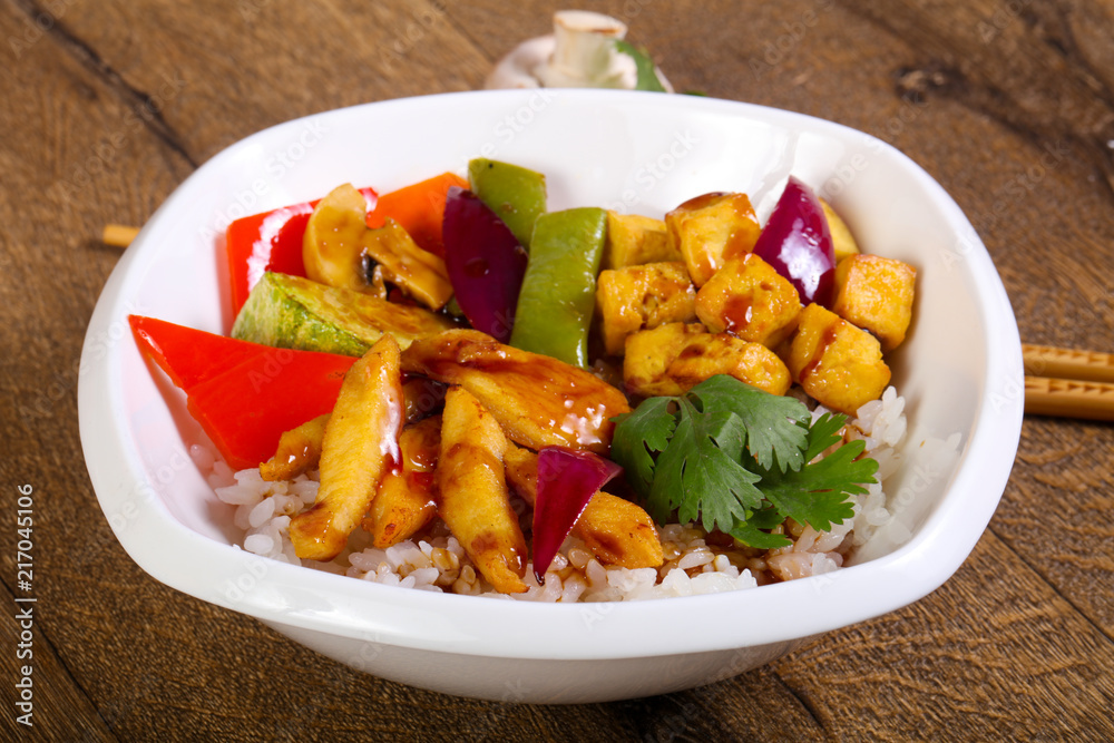 Wok with rice, cheese and tofu Wok with rice, cheese and tofu