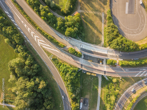 Aerial view of highway interchange on green meadow in Switzerland, Europe