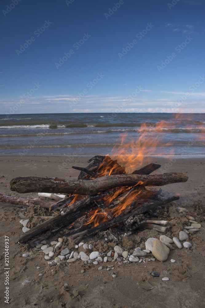 Fototapeta premium A bonfire burns in a camping i