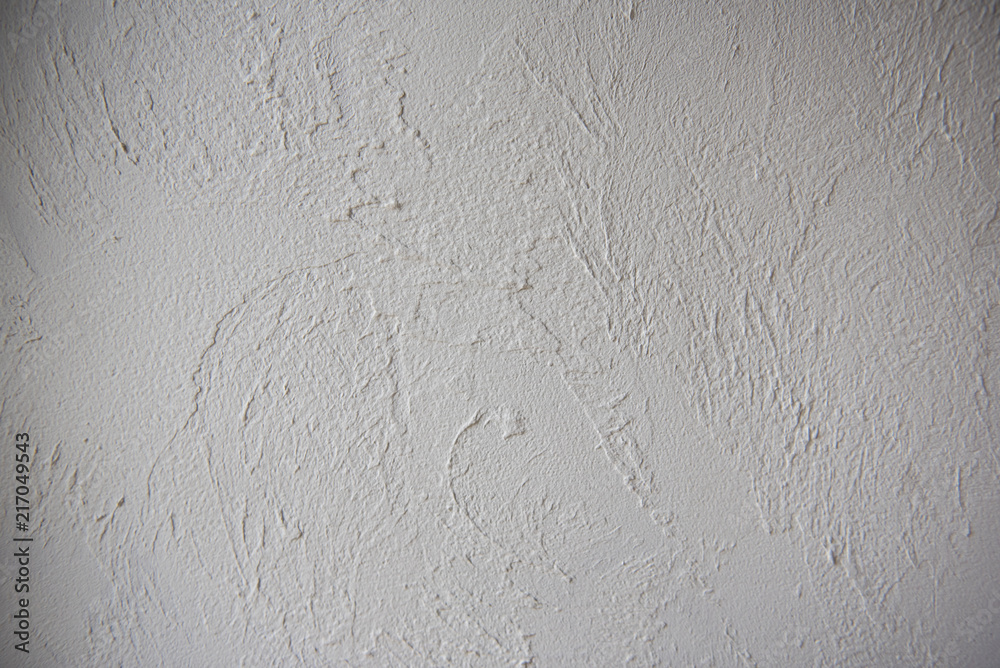 Obraz premium Grey plaster background, cracked and textured leaden cement