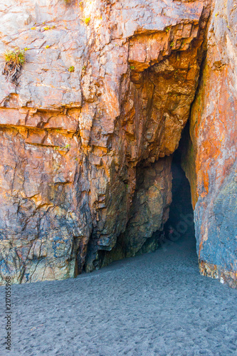 Cueva en las rocas junto al mar Cobquecura región del Bio Bio sur de Chile photo